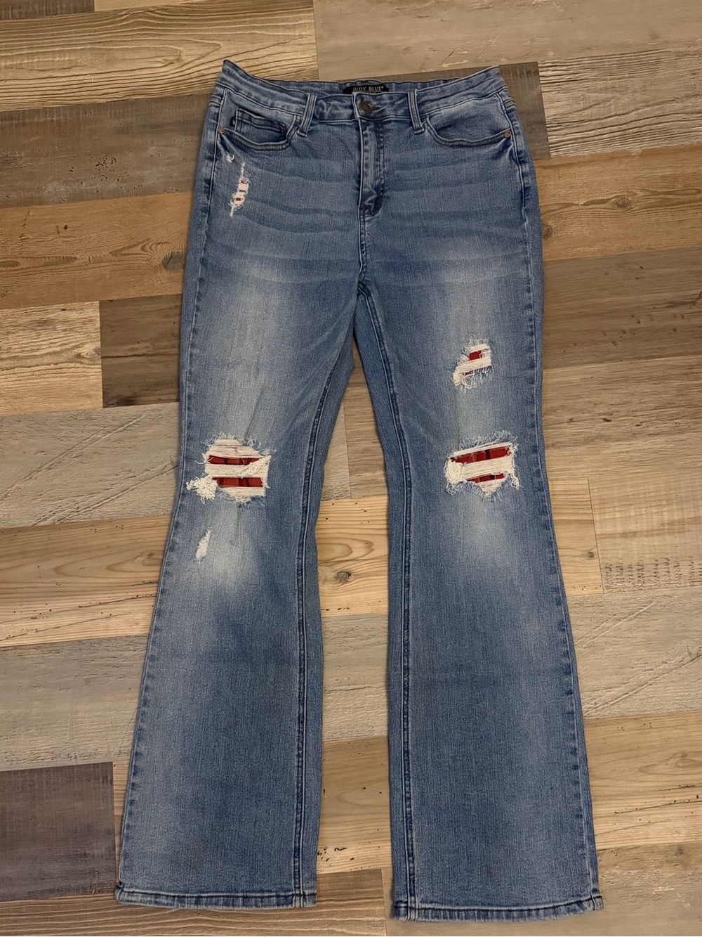 Women’s Judy Blue-Light Wash Distressed Jeans with Red Patch Detail